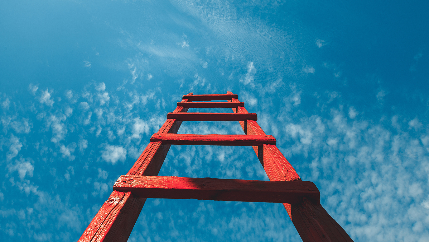 A ladder reaches into the sky.