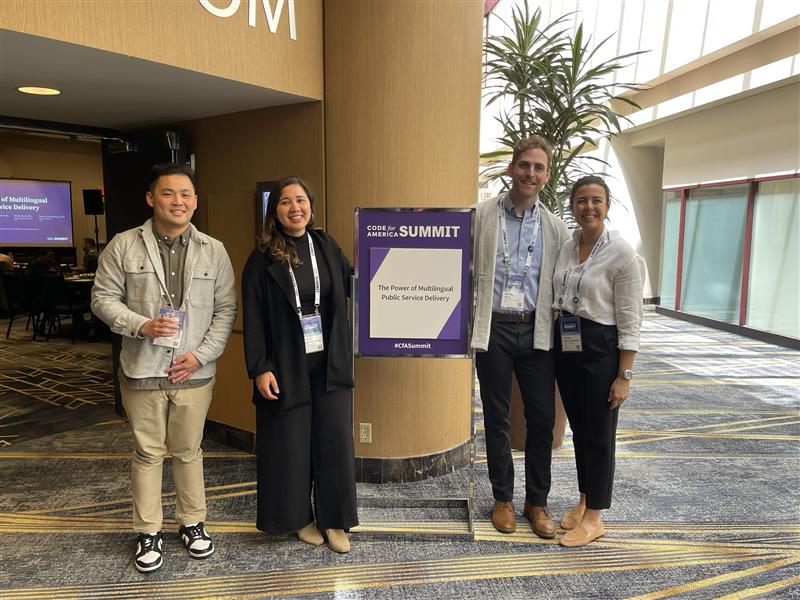 Nicolas Doyle, Seyma Toker Bradshaw, Fatima Gutierrez-Jhong, and Andrew Xie pose by their session sign at the Code for America Summit.