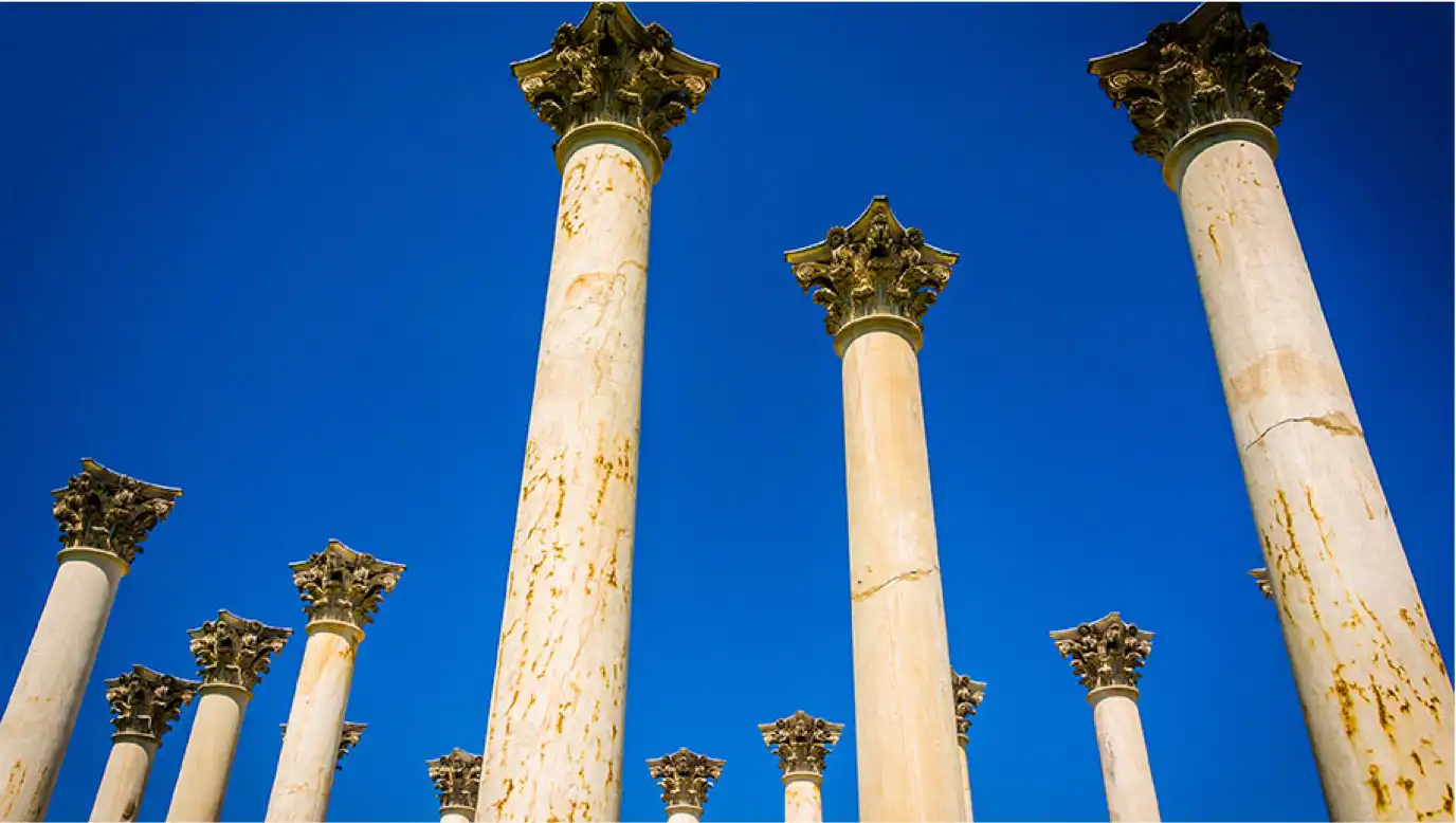 An image of pillars taken from a low angle.